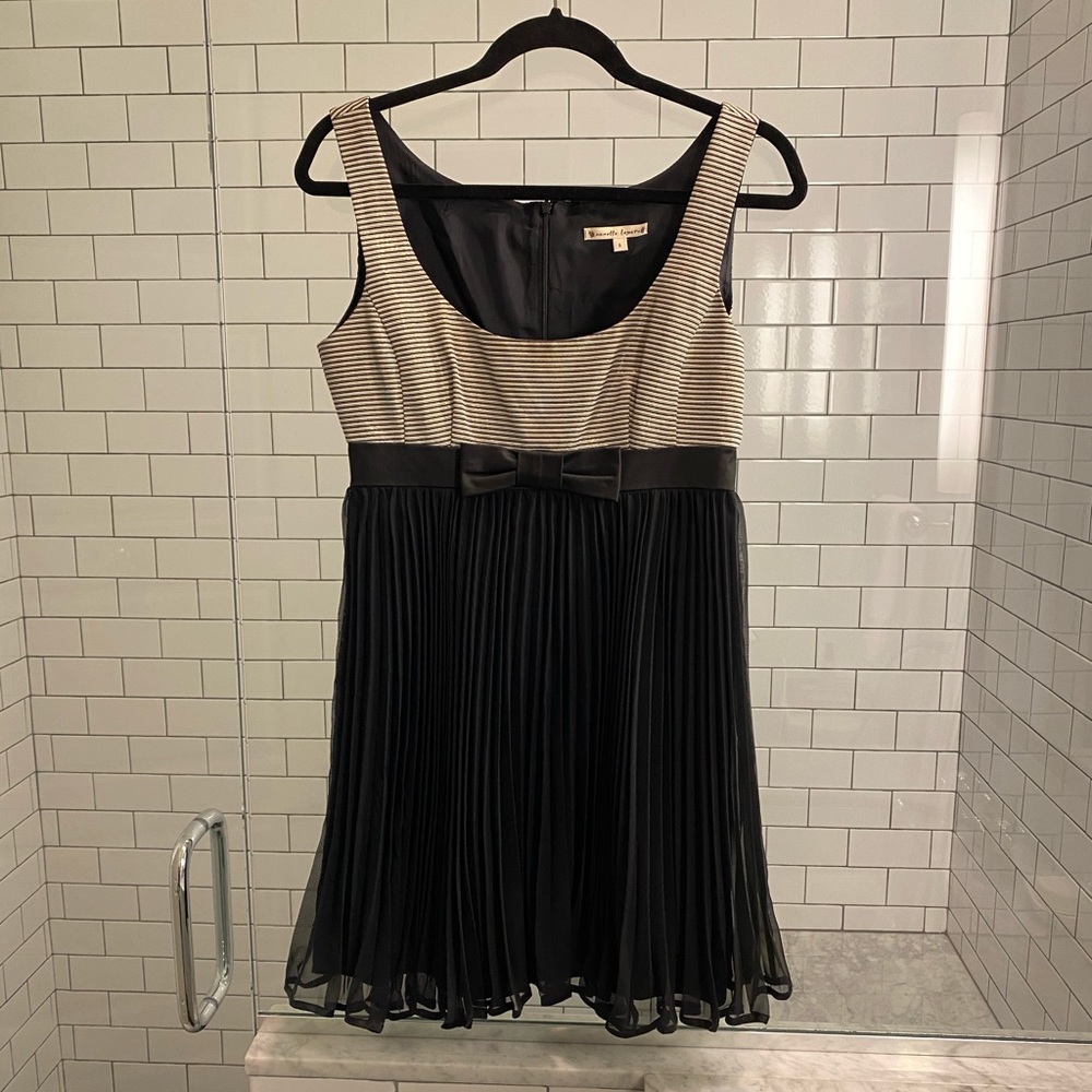 Worn once. Nanette Lepore mini dress with bow.
